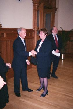 Thomas Lehtonen is congratulated by Voigt's widow, Democratic Town Chairwoman Susan Voigt.