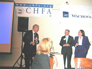 Brian McGrath, representing Greater Dwight Development Corporation, Stephen Hydd of Wachovia Bank and chairman of the CEDF Foundation Board, and Donna Wertenbach, president and CEO of CEDF.