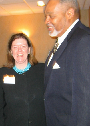 Kim Healey, head of NewAlliance Bank's community foundation, with Cornell Wright, chairman of the CEDF Corporation board.