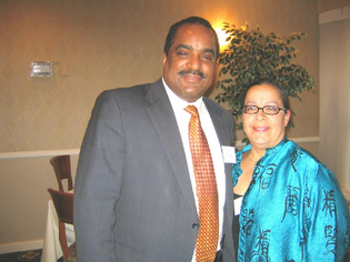 NewAlliance Vice-President Paul Mc Craven with Community Loan Fund's Raquel Santiago Martinez.