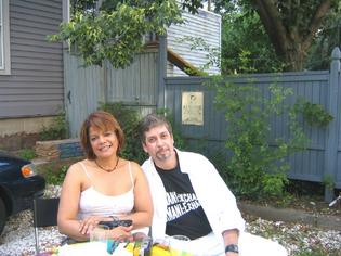 Miriam Mercado of Capital Community College and artist Huberto Castro-Cruz.