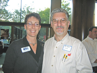 Michelle Wade of United Way staff with John Albini of U.I.