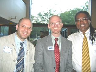 Steve Koch, assistant director of Community Mediation, United Way staffer Robert McGuire, and Tom Ficklin of Empower New Haven.